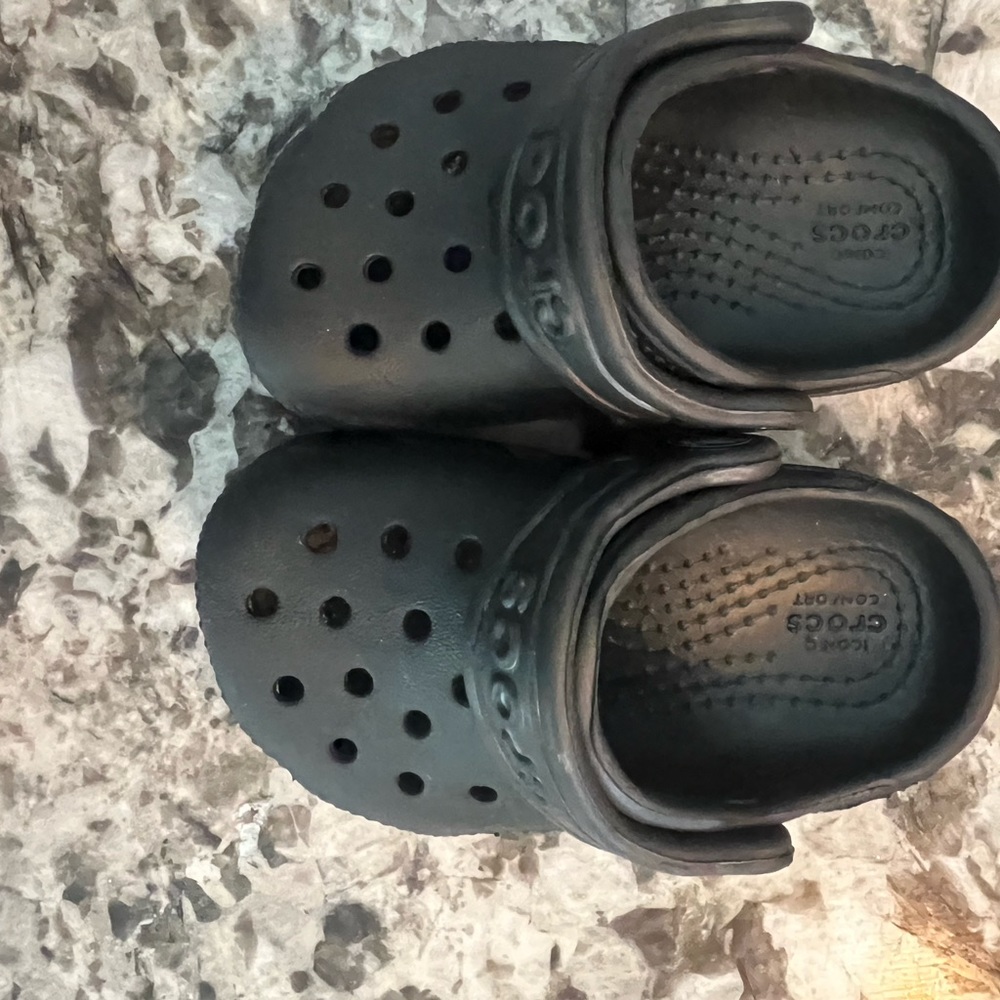 Crocs sz. 4c. New never worn. Color Black. Infant size.